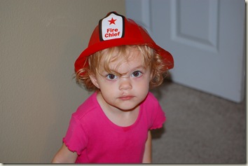 Gabby in her Fire Chief hat from Touch-A-Truck